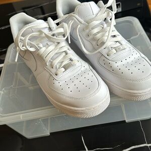 Nike white Air Force 1.     Sz 11.  Wore them one time on vacation.